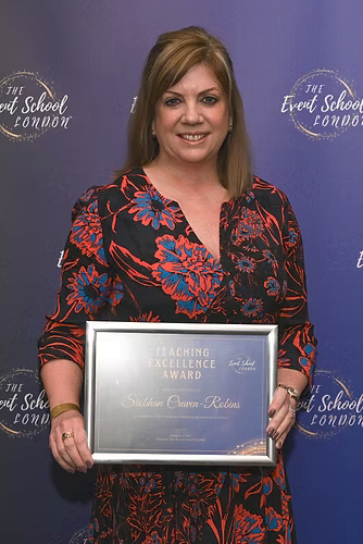 Siobhàn Craven-Robins receiving a Teaching Excellence Award from Event School London